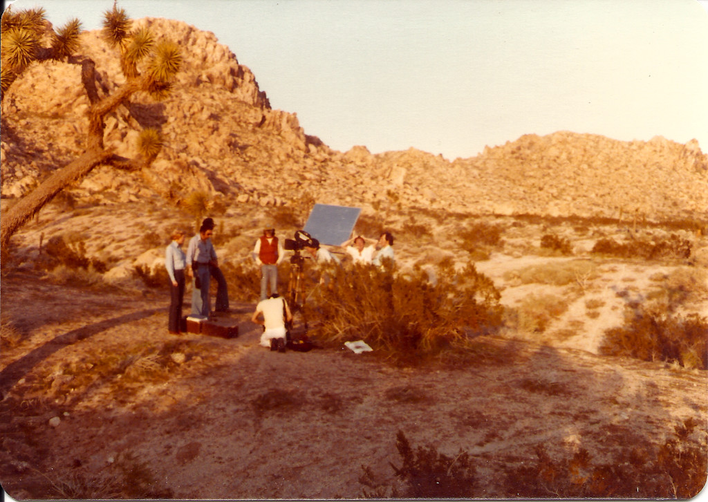Wide still shot of Fate's disinterment with the 7-person crew.